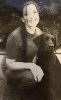 smiling alice with puppy 